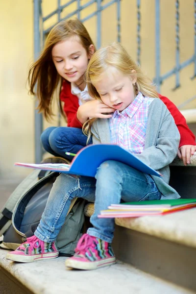 Adorable little schoolgirls — Stock Photo, Image