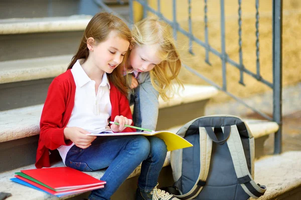 Adorable little schoolgirls — Stock Photo, Image