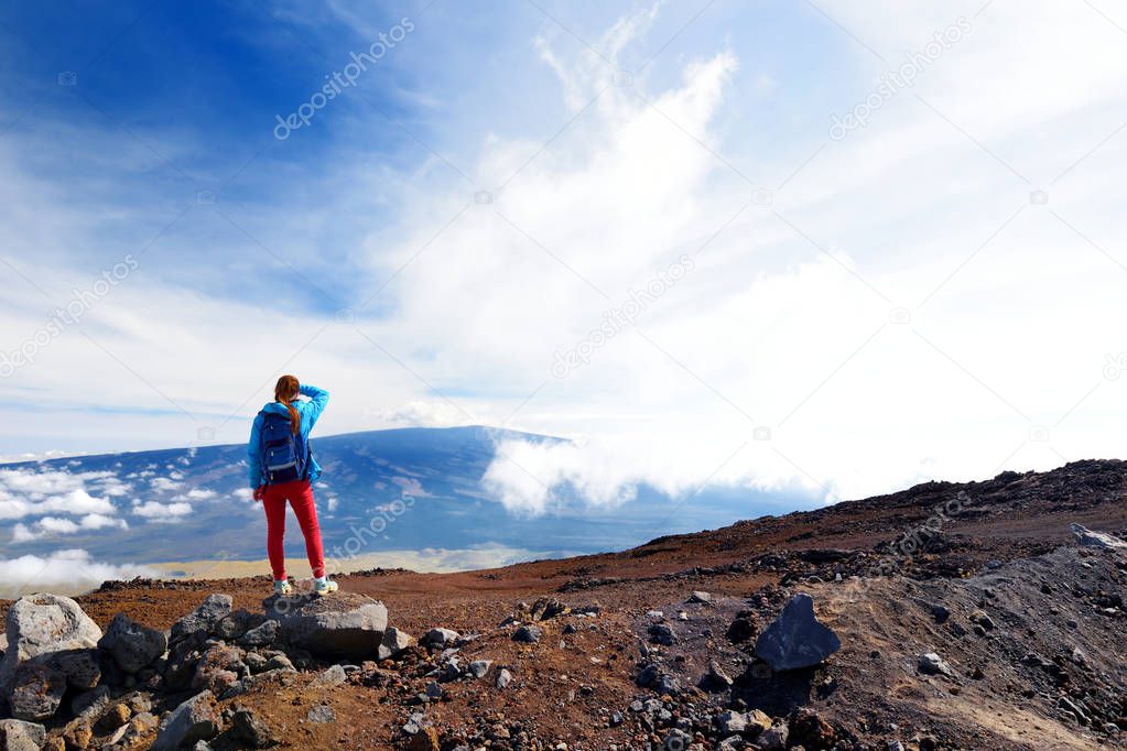 Tourist admiring view of Mauna Loa