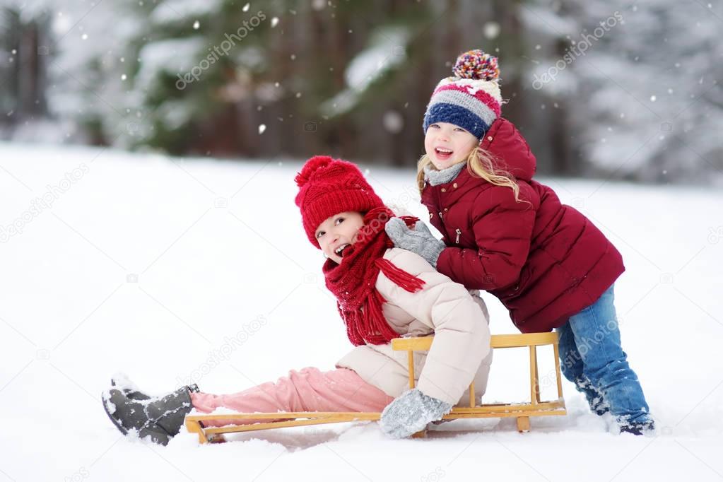 Cute children playing in a snow.