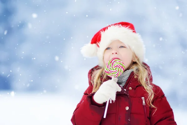 Flicka med jul lollipop — Stockfoto