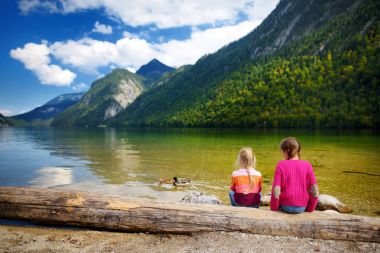 little sisters enjoying view of Konigssee clipart