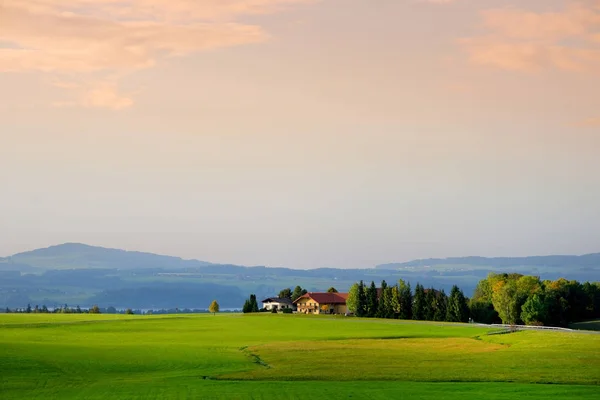 Austrian countryside on sunset. — Stock Photo, Image