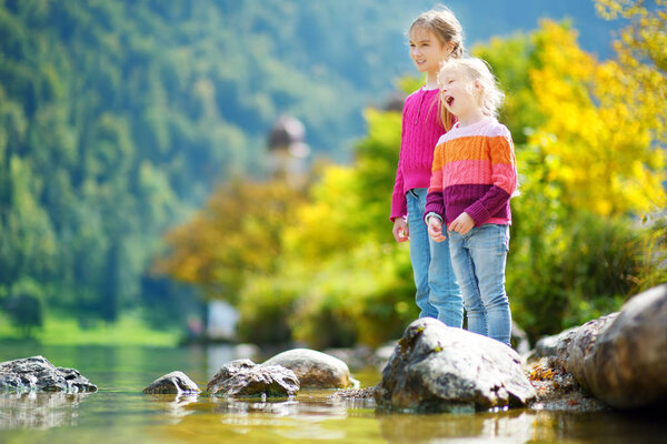 sisters playing near Konigssee lake