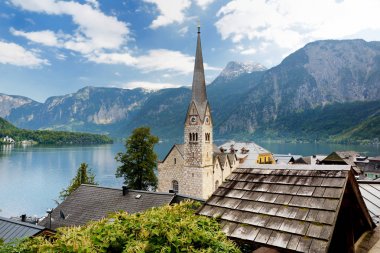 Scenic view of Hallstatt lakeside town in the Austrian Alps in beautiful evening light on beautiful day in autumn. Hallstatt, situated on Hallstatter See, a market town in the district of Gmunden. clipart