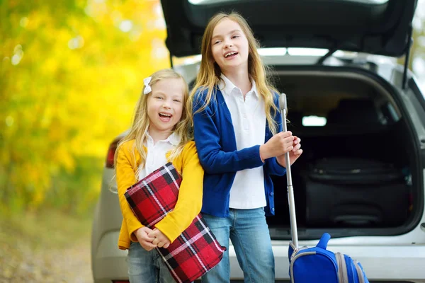 Two Adorable Girls Packing Suitcases Car — Stock Photo, Image