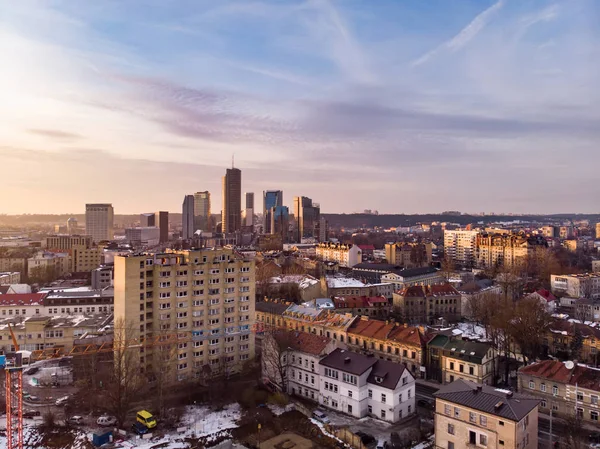 Beautiful foggy Vilnius city scene in winter. Aerial early morning view. Winter city scenery in Vilnius, Lithuania.