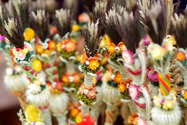 Traditional Lithuanian Easter palms known as verbos sold on Easter market in Vilnius. Lithuanian capital\'s annual traditional crafts fair is held every March on Old Town streets.