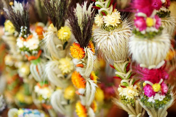 Traditional Lithuanian Easter palms known as verbos sold on Easter market in Vilnius. Lithuanian capital\'s annual traditional crafts fair is held every March on Old Town streets.