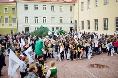 VILNIUS, LITHUANIA - APRIL 1, 2017: People participating in Physicists Day (FiDi), a humorous event organized annually by The Faculty of Physics of Vilnius University clipart