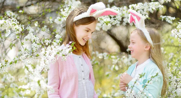 Two Cute Young Sisters Wearing Bunny Ears Blooming Cherry Garden — Stock Photo, Image