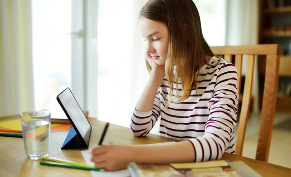 Preteen Schoolgirl Doing Her Homework Digital Tablet Home Child Using — Stock Photo, Image