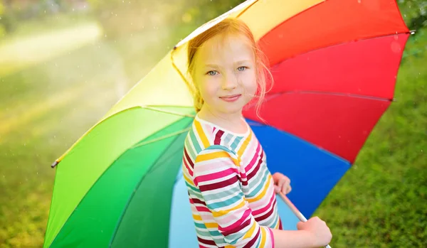 Cute Young Girl Holding Colorful Rainbow Umbrella Rainy Summer Day — Stock Photo, Image
