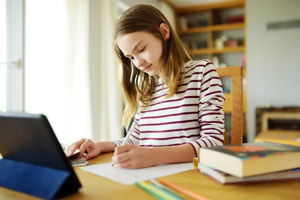 Preteen Schoolgirl Doing Her Homework Digital Tablet Home Child Using — Stock Photo, Image