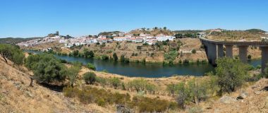 The panoramic view of Mertola town and the bridge over the Guadi