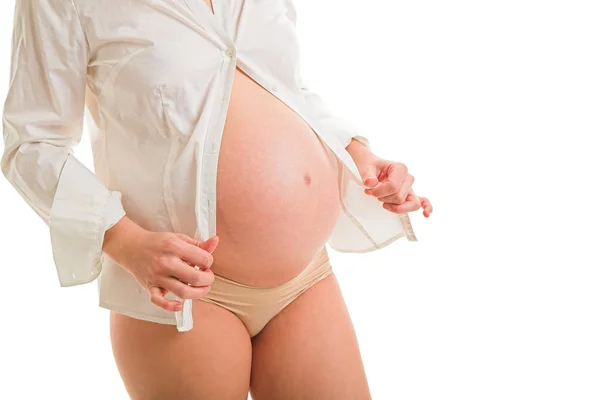 Gravid kvinna i vit blus — Stockfoto