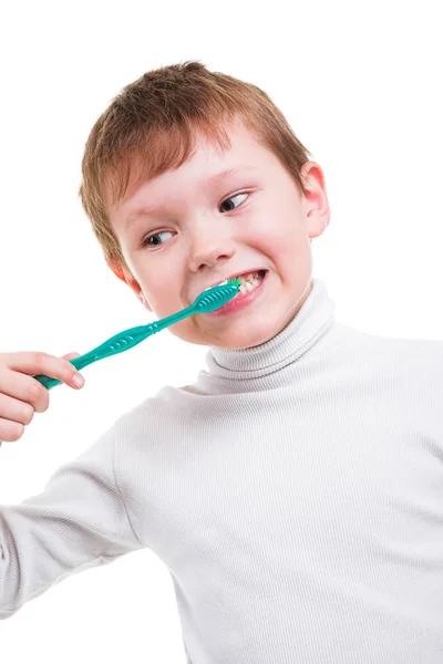 Mały chłopiec myjący zęby. Zdjęcie Stockowe