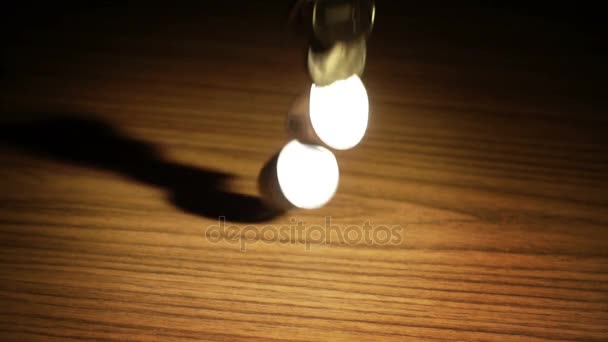 Coins Falling Brown Wooden Background — Stock Video