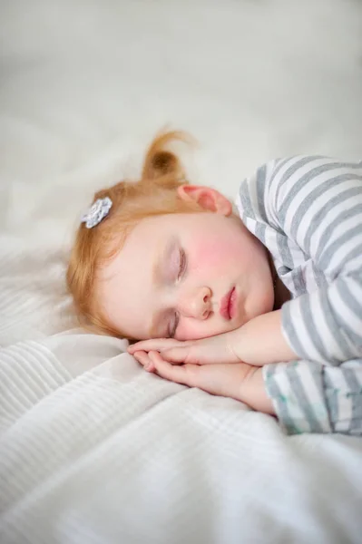 Ruddy Girl Sleeps Her Hands Her Cheek — Stock Photo, Image