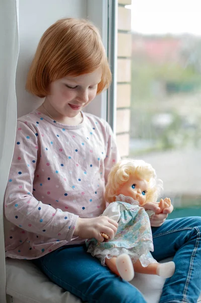 Girl Playing Doll Windowsill — Stock Photo, Image