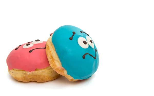 Deliciosos donuts em esmalte de cor isolado — Fotografia de Stock