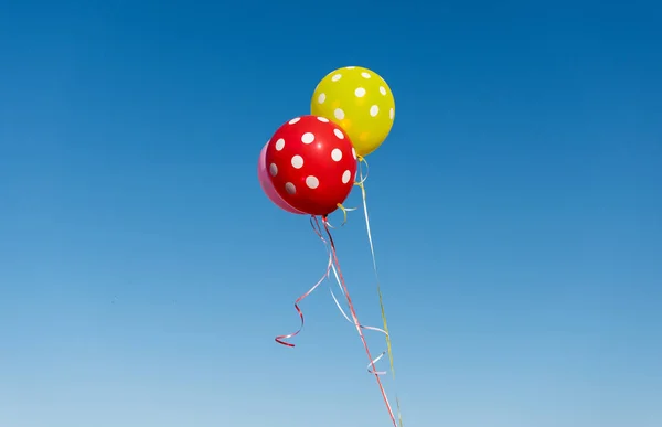 Balloons against the blue sky — Stock Photo, Image