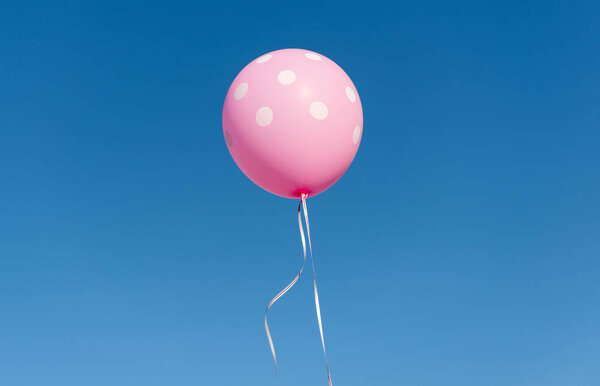 Balloons against the blue sky