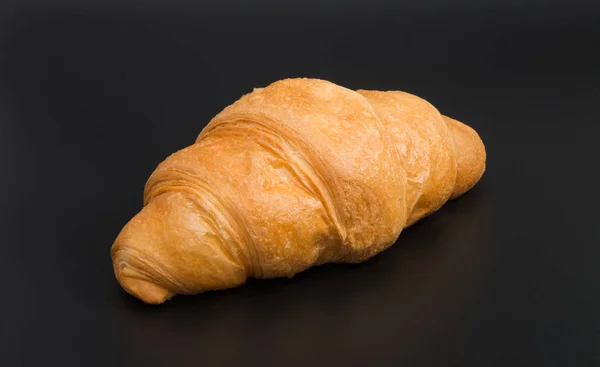 Large croissant isolated — Stock Photo, Image