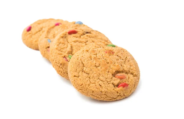 Kekse mit farbigen Schokoladentropfen isoliert — Stockfoto