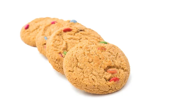 Cookies med färg choklad droppar isolerade — Stockfoto