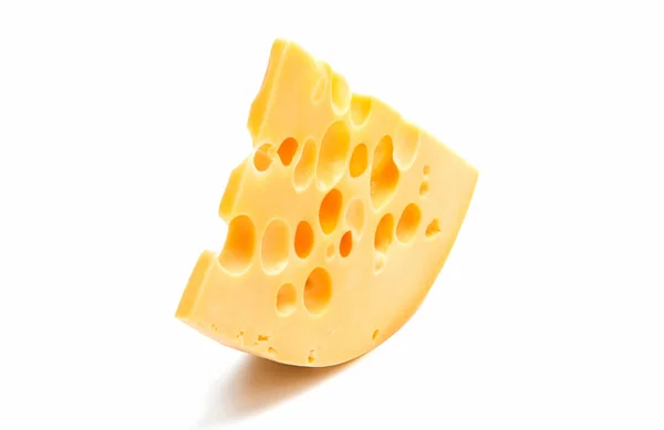 Un trozo de queso aislado — Foto de Stock