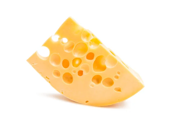 Ein Stück Käse isoliert — Stockfoto