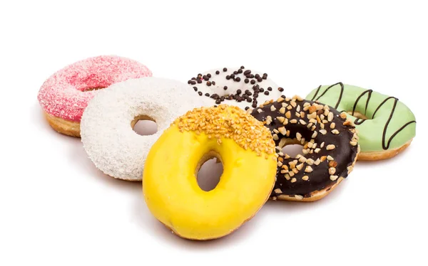 Donuts in farbiger Glasur isoliert — Stockfoto