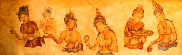 Ancient wall paintings of cloudy maidens at Sigiriya — Stock Photo, Image