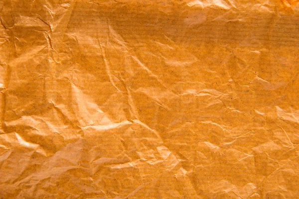 Papel enrugado fundo marrom — Fotografia de Stock