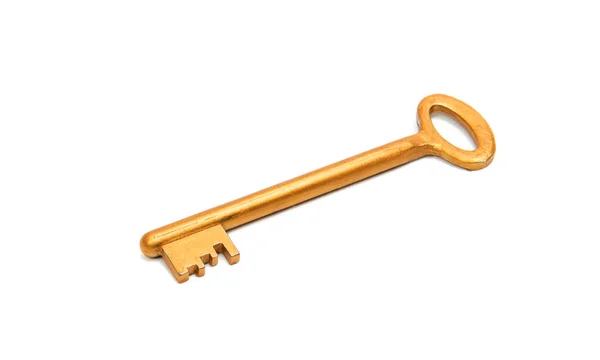 Altın anahtar izole — Stok fotoğraf