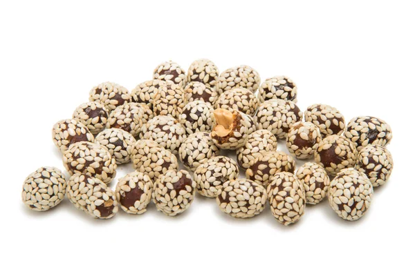 Peanuts in sesame seeds — Stock Photo, Image