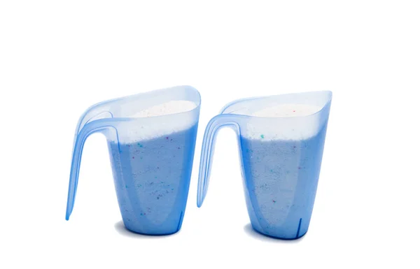 Вимірювальна чашка з миючим засобом ізольована — стокове фото