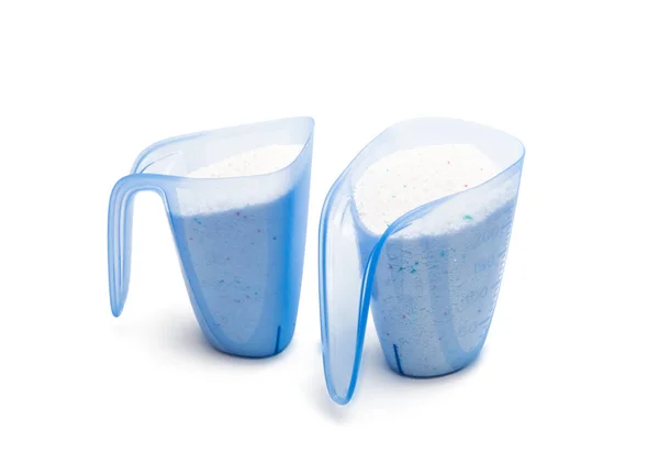 Вимірювання чашки з пральним порошком ізольовано — стокове фото