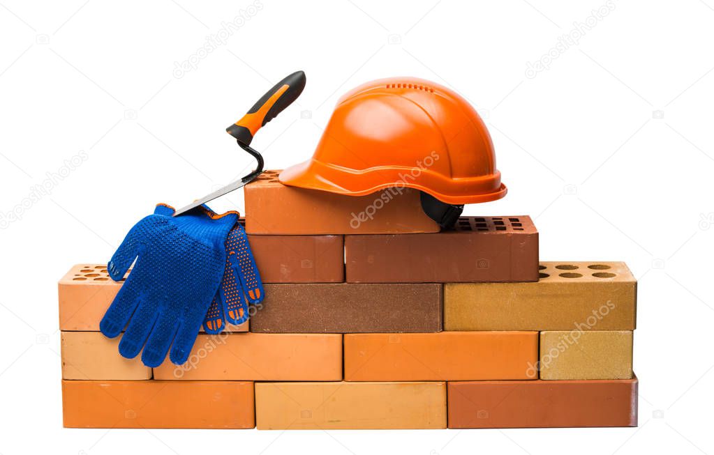 Brick with a helmet isolated 