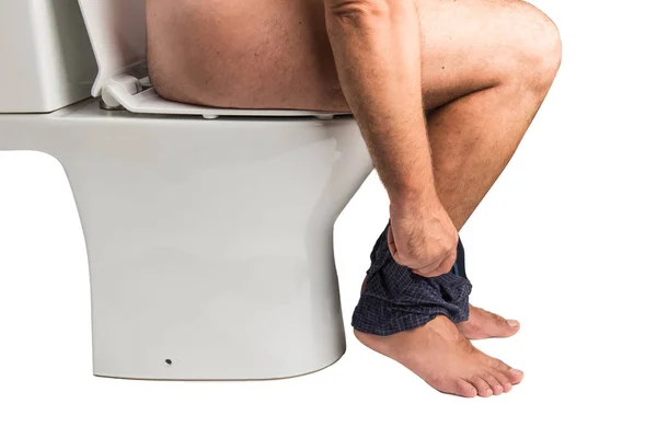 Man op het toilet geïsoleerd — Stockfoto