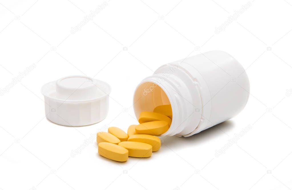 Yellow tablet pills isolated 