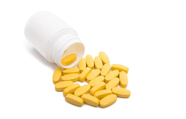 Žluté pilulky s box — Stock fotografie