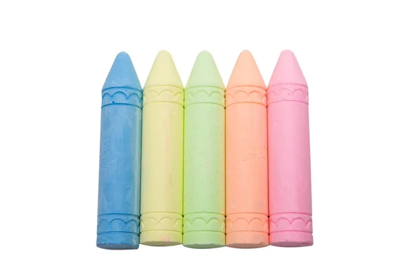 Sticks of pastel colored chalk casting shadow — Stock Photo, Image