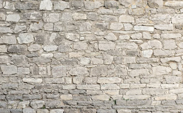 Vieja pared con una piedra — Foto de Stock