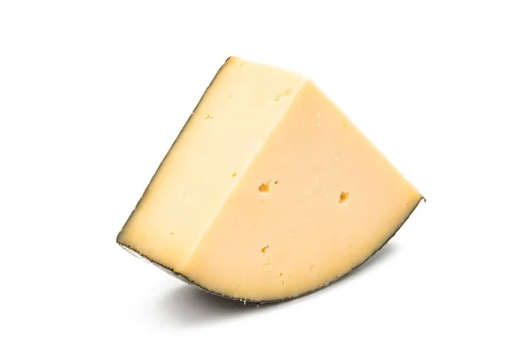 Pedaço de queijo holandês isolado — Fotografia de Stock