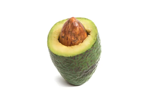 Avocado met steen geïsoleerd — Stockfoto