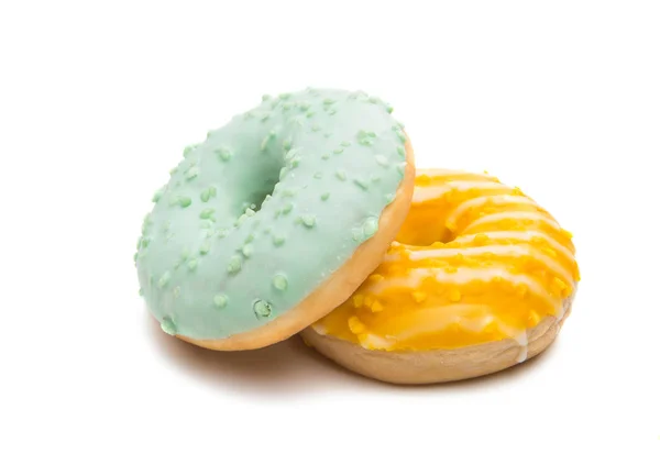 Donuts in glazuur geïsoleerd — Stockfoto