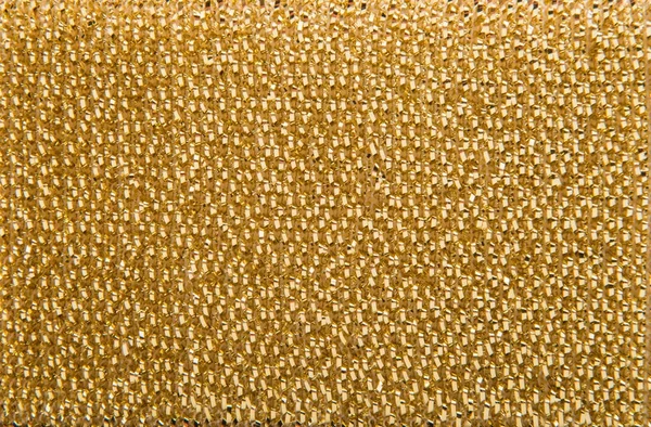 Zlaté kovové houbičky texturu — Stock fotografie