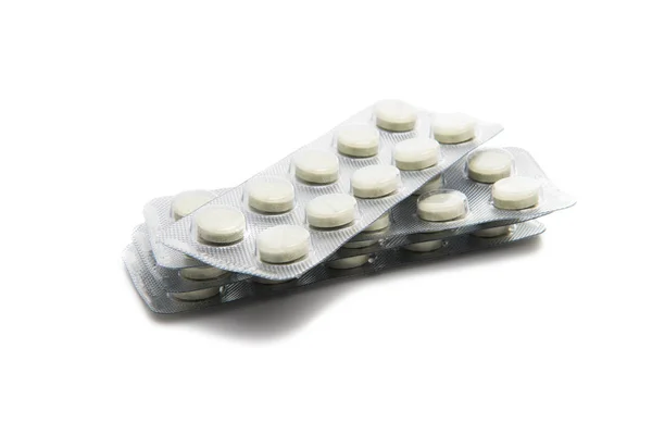 Comprimidos de medicamentos numa embalagem blister não utilizada — Fotografia de Stock